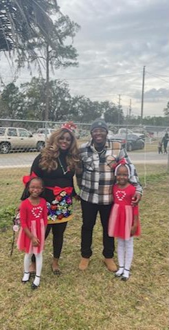 people and children at christmas park event