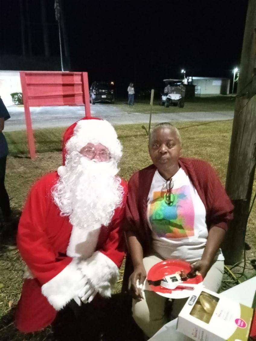 Santa and lady at park 