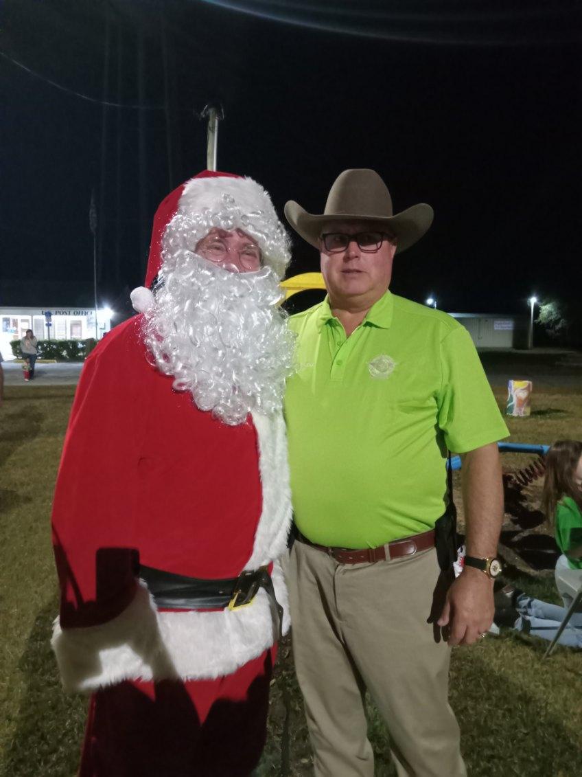 Santa and man at park 