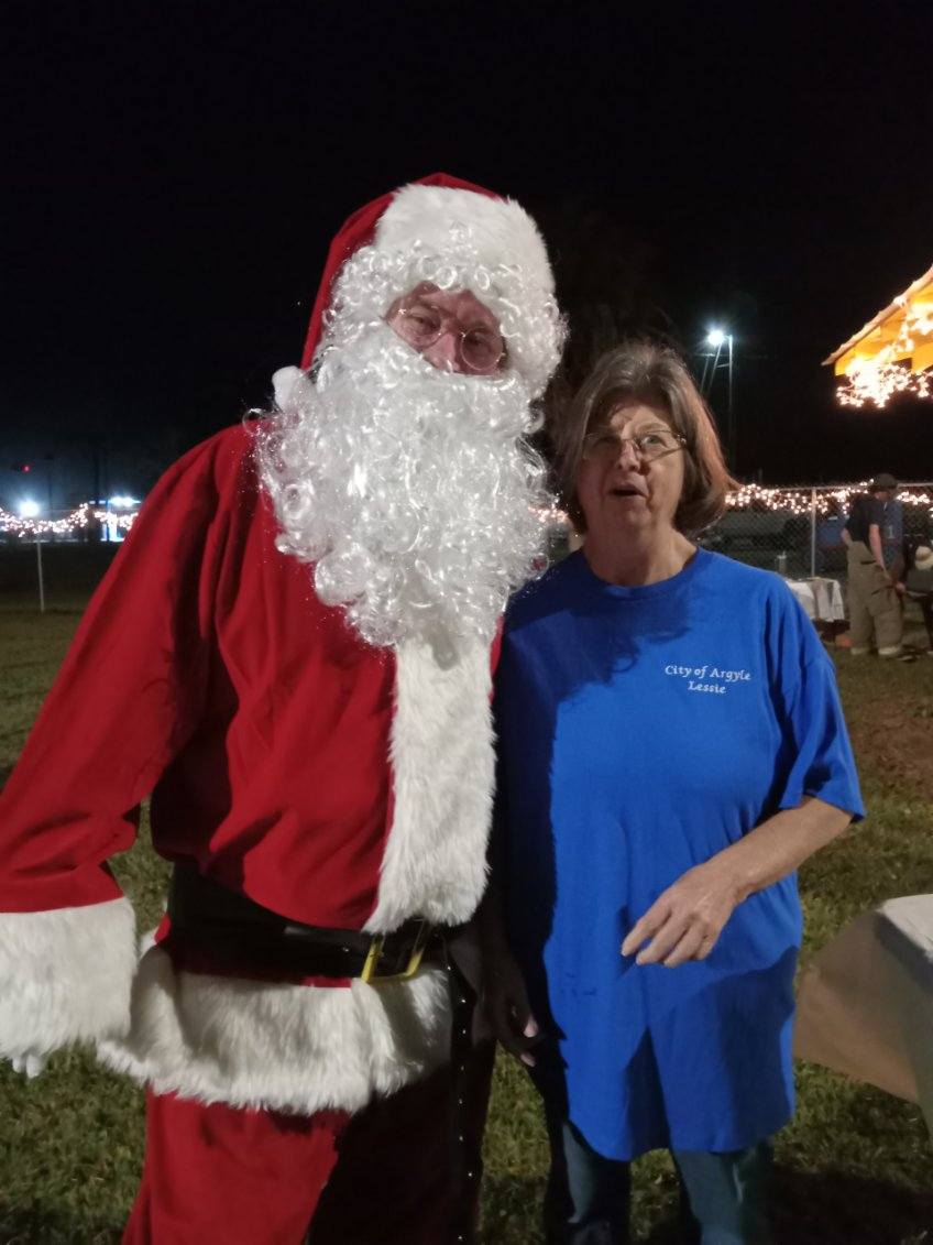 Santa and lady at park 